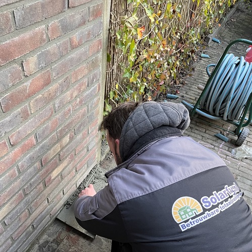 Renoveren en herstellen gemetselde tuinmuur woning Heerhugowaard Maart 2022