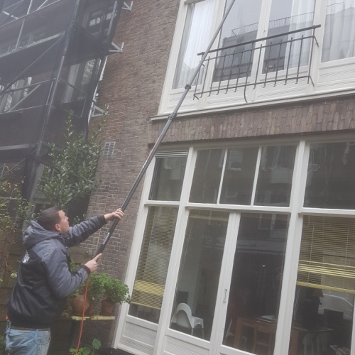 Schoonmaak buitenkant woningen vastgoedondernemer Amsterdam November 2019