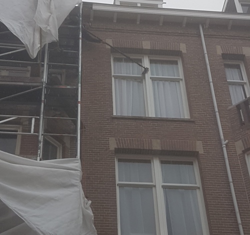 Schoonmaak buitenkant woningen vastgoedondernemer Amsterdam November 2019