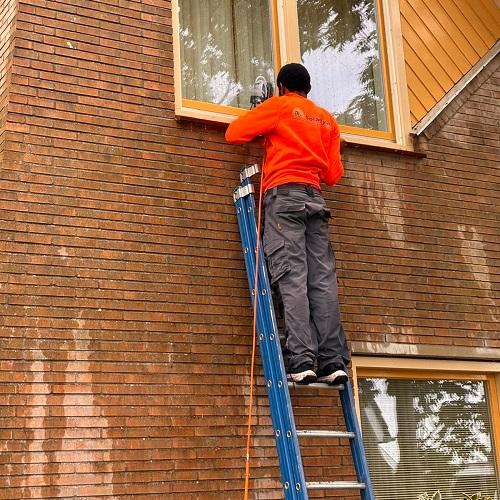 Reiniging houtwerk, gevels en terras Schermerhorn Augustus 2025