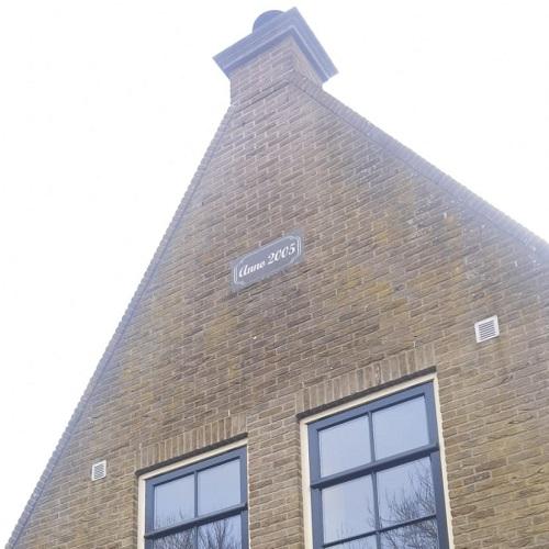 Reinigen gevel en dakpannen woning Westwoud Maart 2026