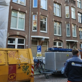 Schoonmaak buitenkant woningen vastgoedondernemer Amsterdam November 2019