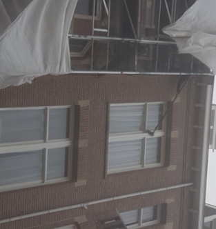 Schoonmaak buitenkant woningen vastgoedondernemer Amsterdam November 2019