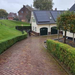 Reiniging houtwerk buitenzijde woning Ouderkerk aan den ijssel Oktober 2021