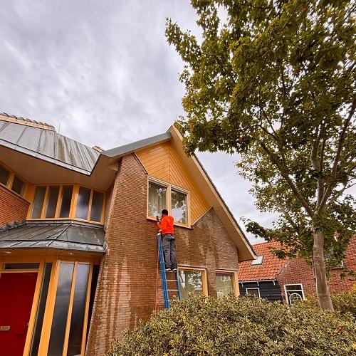 Reiniging houtwerk, gevels en terras Schermerhorn Augustus 2025