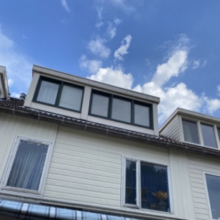Schoonmaken dakkapellen en gevelbekleding woningen Alkmaar de Mare Mei 2021