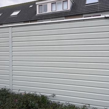 Reiniging bergruimtes straat met woningen in Velserbroek December 2022