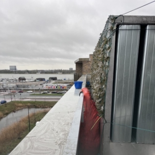 Reiniging boeidelen, balkonranden en dakafwerking VvE Amsterdam April 2022