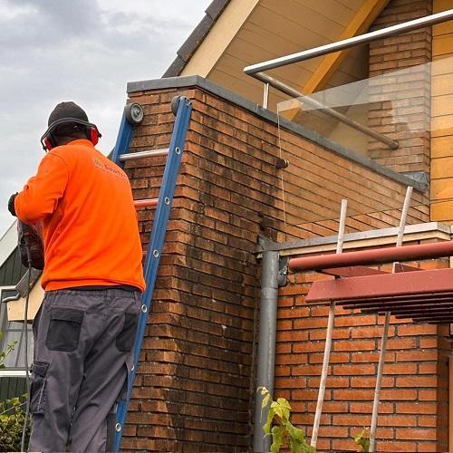 Reiniging houtwerk, gevels en terras Schermerhorn Augustus 2025