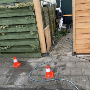 Schoonmaken dakgootranden, zonnepanelen en houtwerk woning Zuid Scharwoude Maart 2021